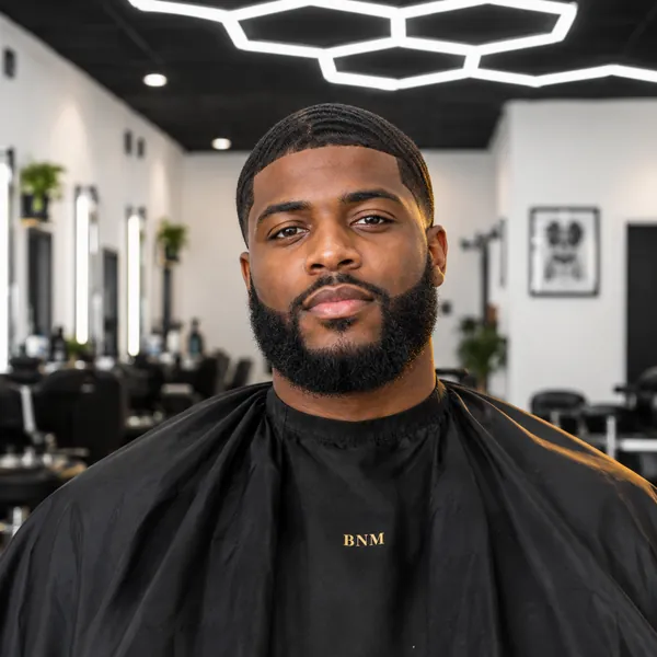 Andre, with a full, sharply shaped beard.